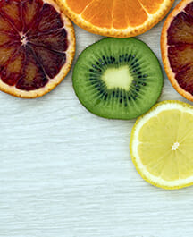 Various slices of fruit including orange, kiwi and lemon as nutrition for health and wellbeing in integrative addiction care and recovery.
